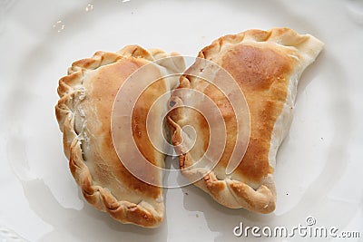  Argentine empanadas. Typical regional food from Argentina. Homemade meat pies. Food. National holiday dish. Classic scramble. Stock Photo