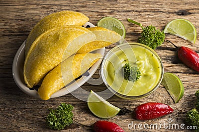 Empanadas with avocado sauce, traditional Colombian food Stock Photo