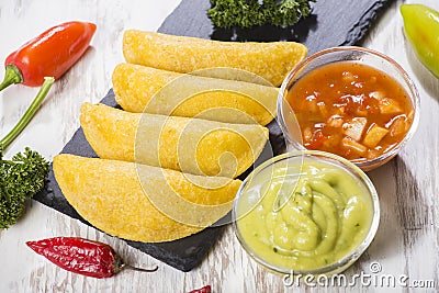 Empanadas with hot sauce, traditional Colombian food Stock Photo