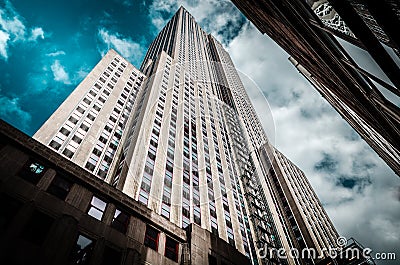 Empire state building, low angle with dramatic clouds Editorial Stock Photo