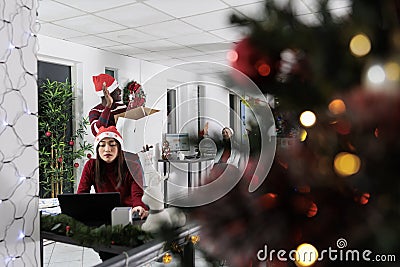 Employee greeting coworkers at new job Stock Photo