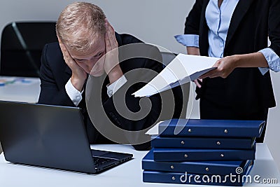 Employee and his demanding boss Stock Photo