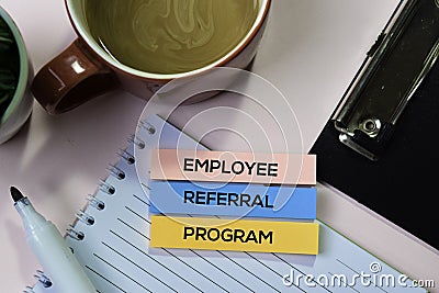 Employee Referral Program text on sticky notes with office desk concept Stock Photo