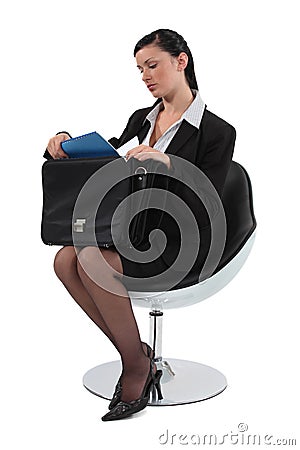 Employee sitting on a chair Stock Photo