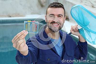Employee of swimming pool cleaning service Stock Photo