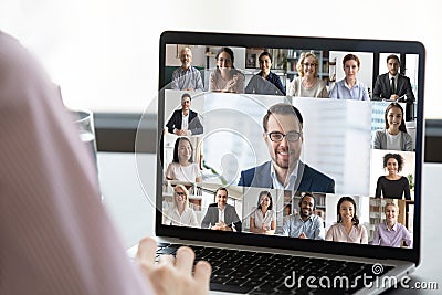 Employee talk on webcam conference with diverse colleagues Stock Photo