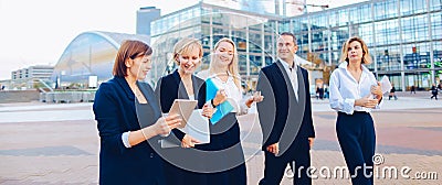 Employees of business corporation talking by smartphone and advi Stock Photo