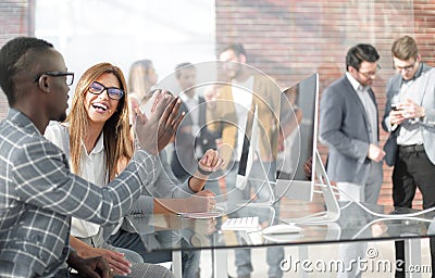 Employees of the company hold a briefing in the office Stock Photo