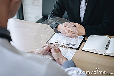 Employer arriving for a job interview, businessman listen to candidate answers explaining about his profile and colloquy dream job Stock Photo