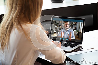 Employer listen applicant during job interview using webcam and pc Stock Photo