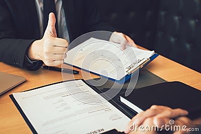 Employers give a thumbs-up for job applications for new employee in the office room Stock Photo