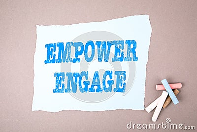 EMPOWER ENGAGE concept. Text on note sheet Stock Photo