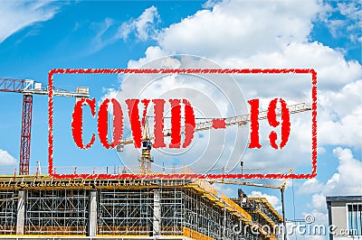Empty and abandoned building construction site with scaffolds and construction crane closed for coronavirus or covid 19 virus pand Stock Photo