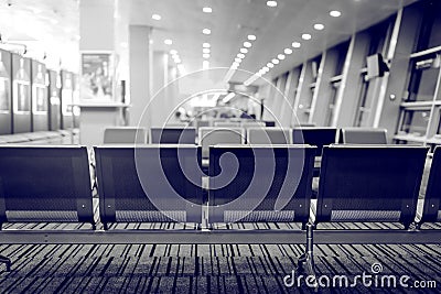 Empty airport seats close up background. Stock Photo