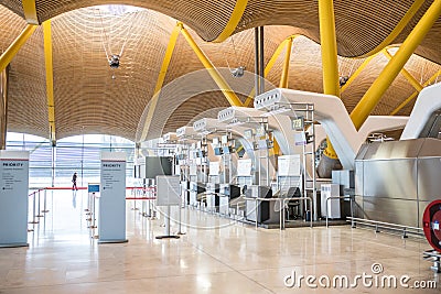 Empty airport terminal and check-in counters Stock Photo