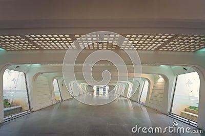 Empty airport terminal due to coronavirus pandemic and suspended airline flights. Empty airport terminal. Mechanical corridor with Stock Photo