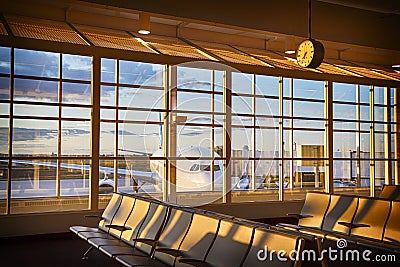 Empty airport terminal lounge with airplane on background Stock Photo