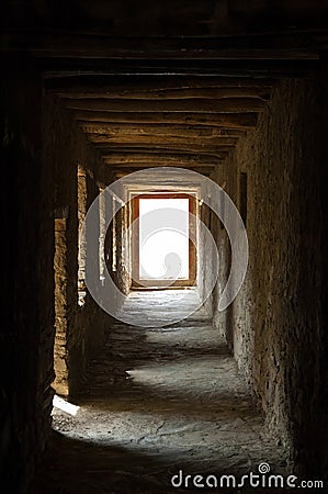 Empty aisle in an ancient buddhist monastery Stock Photo