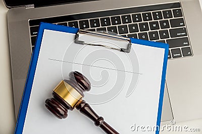 An empty application form of document and wooden gavel isolated. Stock Photo