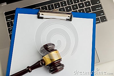 An empty application form of document and wooden gavel isolated. Stock Photo