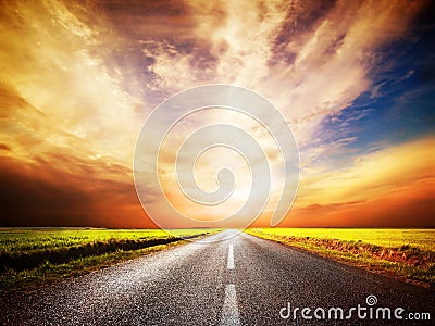 Empty asphalt road. Sunset Sky Stock Photo