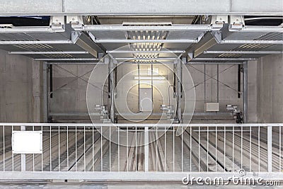 Empty automatic car Parking Lift Stock Photo