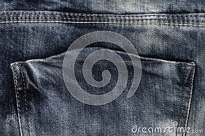 Empty back jeans pocket close-up, navy denim texture, double rough straight stitch on jeans Stock Photo