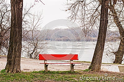 Empty bench near the river Stock Photo