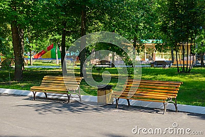 Empty benches in an amusement park Stock Photo