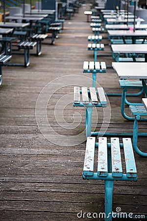 Empty benches and tables Stock Photo