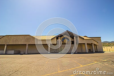 Empty Big Box Store With Boarded Up Entrance Stock Photo