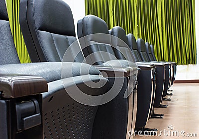 Empty black chairs in a conference Stock Photo