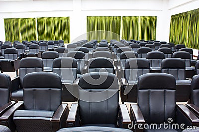 Empty black chairs in a conference Stock Photo