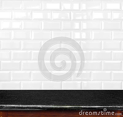 Empty black marble table and ceramic tile brick wall in background. product display template. Stock Photo