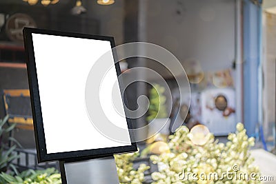 Empty black menu stand next to cafe entrance Stock Photo