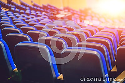 Empty blue chairs at cinema or theater or a conference room Stock Photo