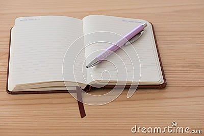 Empty booklet with pen Stock Photo