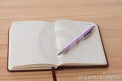 Empty booklet with pen Stock Photo