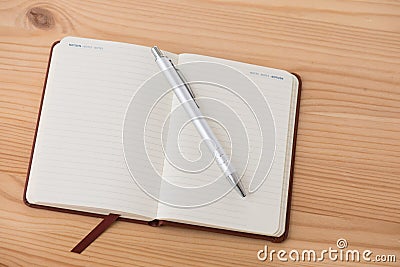 Empty booklet with pen Stock Photo