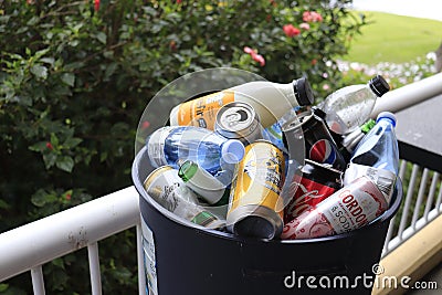 Earn and Return Program, Empty bottles and cans 10 cents collected, photography Editorial Stock Photo