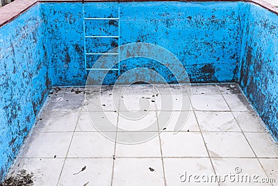 Empty and dirty swimming pool. Stock Photo