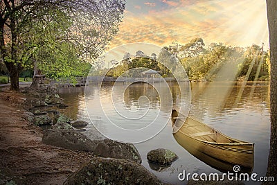 An empty canoe on a picturesque lake Stock Photo