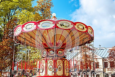 Empty Carousel Merry-Go-Round With Seats Suspended On Chains Wi Editorial Stock Photo