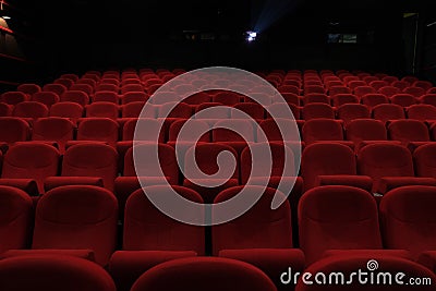 Empty cinema hall with red seats. Movie theatre. Stock Photo