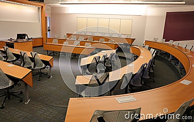 Empty Classroom with Projector & Blank Screen Stock Photo