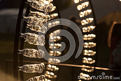 Empty Coca Cola bottles are arranged in a shape Editorial Stock Photo