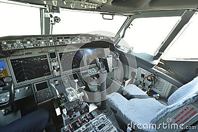 Empty cokpit plane, fly-deck of modern airplane Boeing 737-8 Max. Editorial Stock Photo