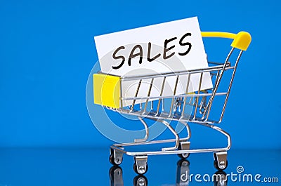 Empty consumer trolley with inscription inside - SALES Stock Photo