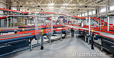 Cardboard boxes on conveyor belt.parcels transportation system concept Stock Photo