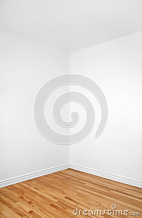 Empty corner of a room with wooden floor Stock Photo